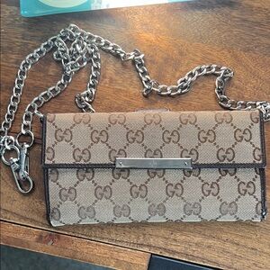 Authentic and Immaculate Gucci Beige and Brown Monogram Clutch with Silver Chain